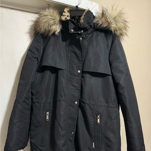 New ladies long coat size large with leopard fur inside